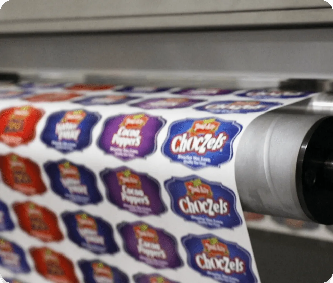 colorful digitally printed product labels being produced on commercial printing equipment