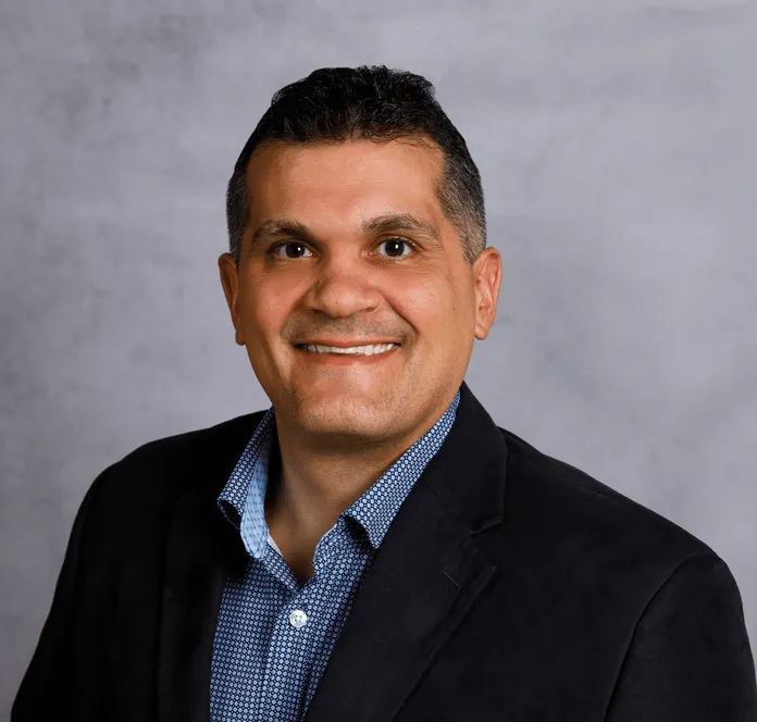 a head shot of Eric DePhillips