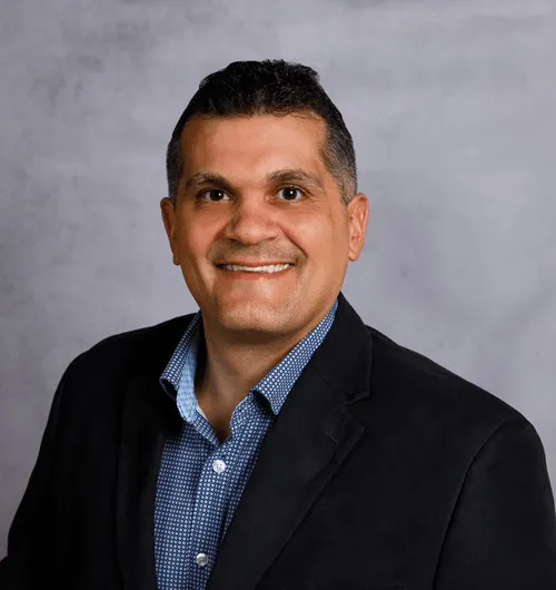 a head shot of Eric DePhillips