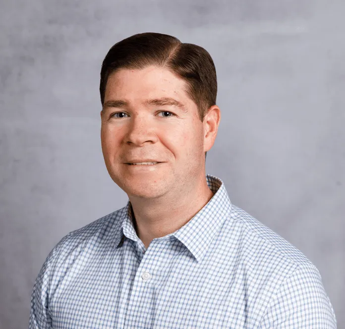 a head shot of Mike Reese